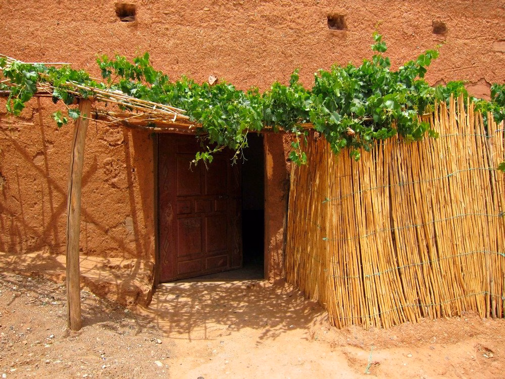 Tour from Marrakech to Erg Chegaga Desert - Ait Ben Haddou vine doorway private tour Marrakech desert 3 days English