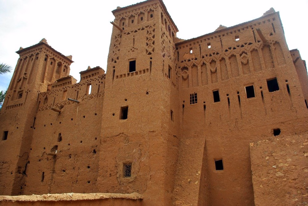 Tour from Marrakech to Erg Chegaga Desert - Ait Ben Haddou ancient carved walls private tour Marrakech desert Erg Chegaga English